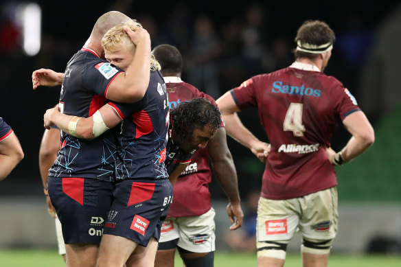 Carter Gordon of the Rebels and Cabous Eloff of the Rebels celebrate the round 5 win.