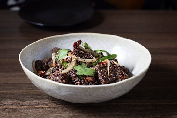 Lamb backstrap, marinated in coriander and cumin and stir-fried with Szechuan pepper. 