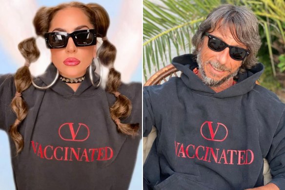 Lady Gaga and Valentino designer Pier Paolo Piccioli wearing their (V) Vaccinated hoodies.
