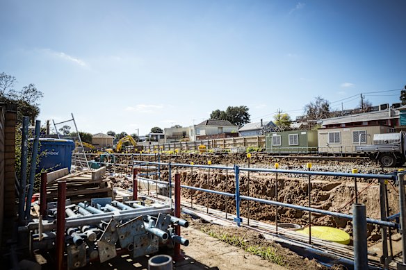 Diggers at work excavating basement car parks for the Neometro townhouse development in Brunswick.