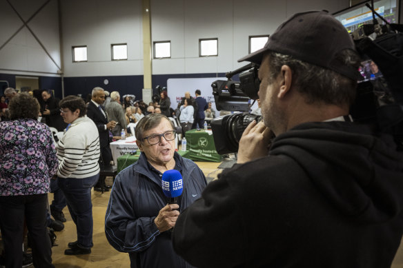 Coffa speaks to the media during June’s international event at the Victorian Weightlifting Centre.