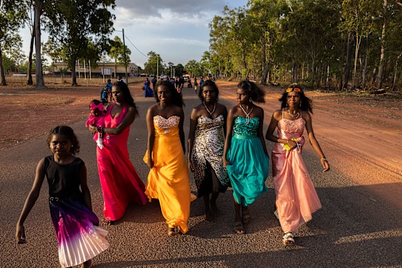 THE BALL - All frocked up with somewhere to go, a group of partygoers make their way to the Aurukun Ball during NAIDOC Week. The event is “a mixture of glamour and cultural pride” for the remote Cape York community, says Paul Blackmore, a Byron Bay-based photojournalist.