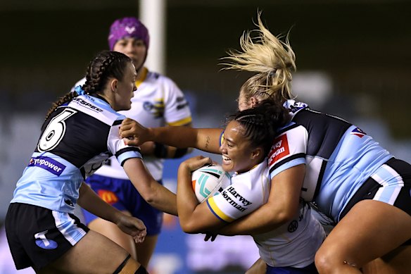 Lindsay Tui takes on the Sharks defence.