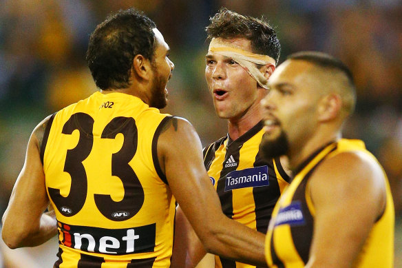 Stand-in Hawks skipper Jaeger O’Meara with former teammate Cyril Rioli in 2018, before Rioli’s retirement.