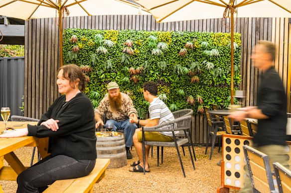The dog-friendly courtyard faces the river.