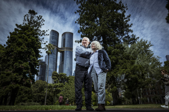 Stan Capp (left) and Pam Lyons, from the Eastenders residents group, in the Carlton Gardens with the Sapphire by the Gardens and Shangri-La development behind them. 