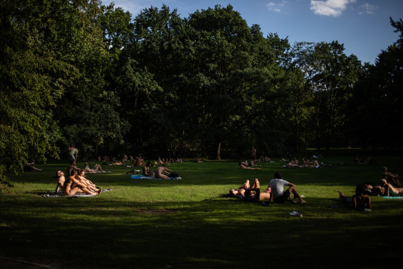 Nudists sunbathe in the Tiergarten, Berlin's most popular inner-city park.