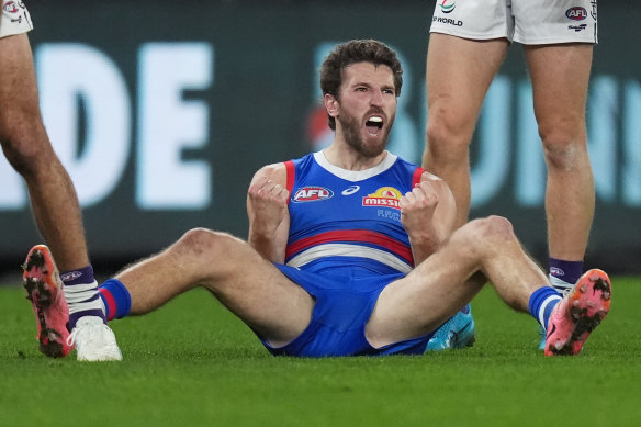 Marcus Bontempelli of the Bulldogs celebrates kicking a goal.