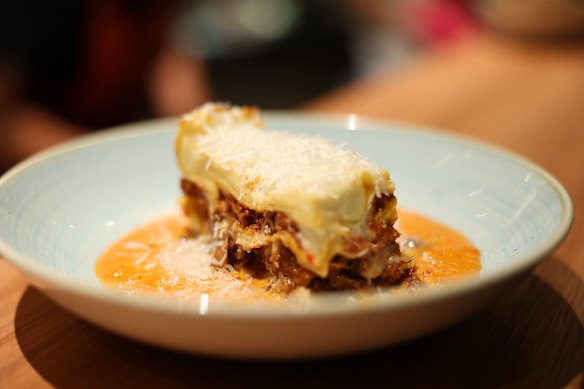 Beef shin lasagne with vodka sauce and parmigiano.