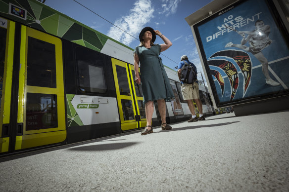 Krista Milne, co-chief heat officer at the City of Melbourne, on the grey tram platform at the Australian Open.