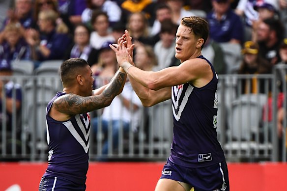 Matt Taberner and Michael Walters celebrate a goal.