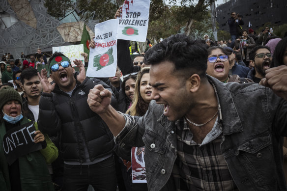 Members of Melbourne’s Bangladeshi community rally in Federation Square on Sunday.