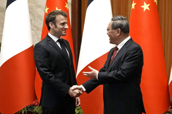 Emmanuel Macron with Chinese Premier Li Qiang on Thursday. Beijing is on a diplomatic blitz at the moment.