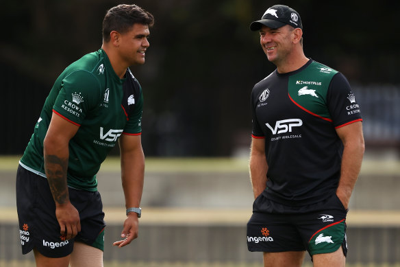 Tight bond ... Latrell Mitchell speaks with Jason Demetriou at training earlier in the year.
