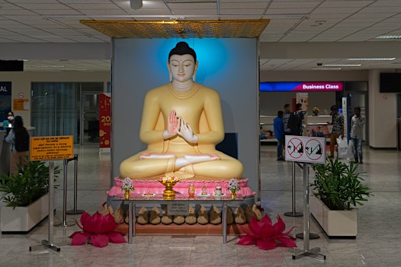 The large, lemon-coloured Buddha welcomes you to Colombo’s airport.