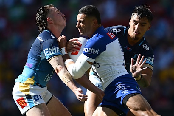 Canterbury’s Marcelo Montoya prepares to crash into Gold Coast defenders.