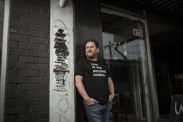 Tim Cohen has twice had his Brunswick East wine store marked by a symbol used by Hamas. 