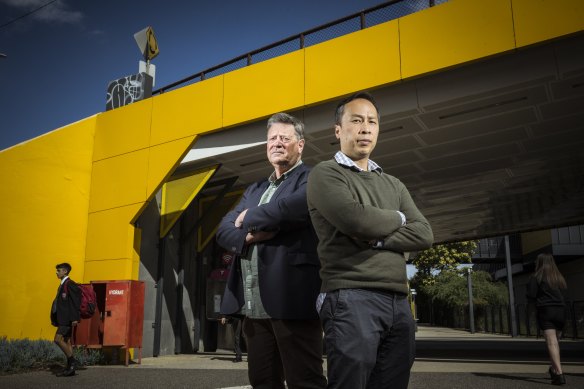 Greater Sunshine Community Alliance co-founder John Hedditch and Sunshine Business Association president Vu Du outside the Sunshine Railway Station overpass. 