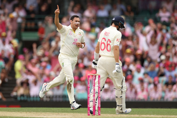 Scott Boland celebrates the wicket of Joe Root. 
