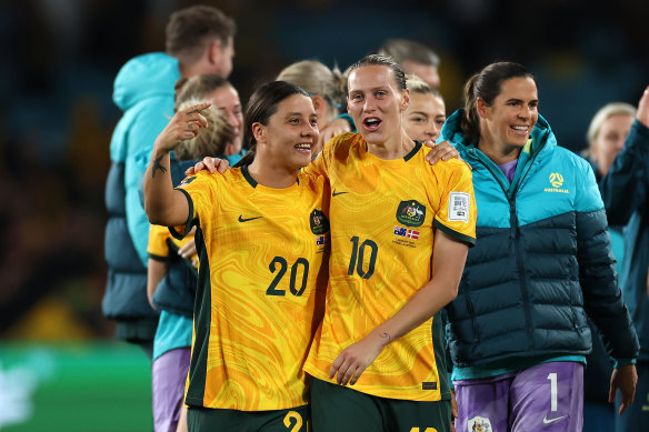 Emily van Egmond and childhood friend Sam Kerr celebrate Australia’s 2-0 round of 16 win over Denmark.