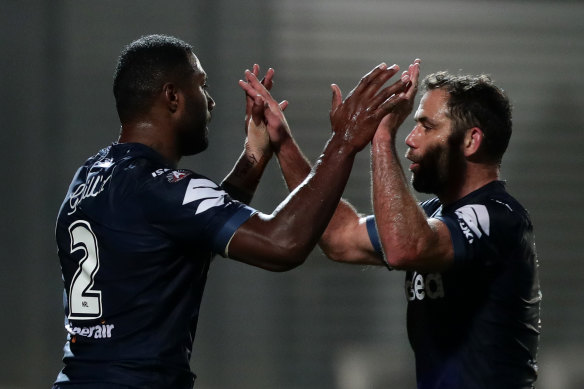 Suliasi Vunivalu celebrates with Cameron Smith.