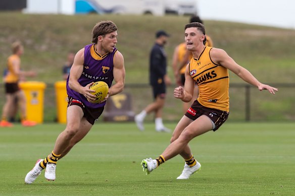 Dylan Moore (left) and Connor Macdonald during a Hawthorn training session on Wednesday.