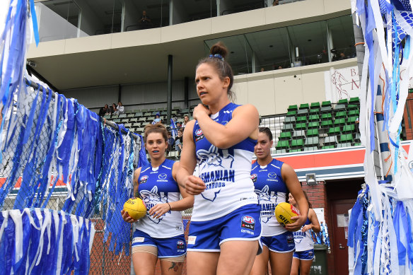 Emma Kearney leads the team out.