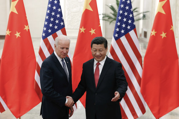 Joe Biden with Xi Jinping, pictured in 2013 when Biden was US vice-president. 