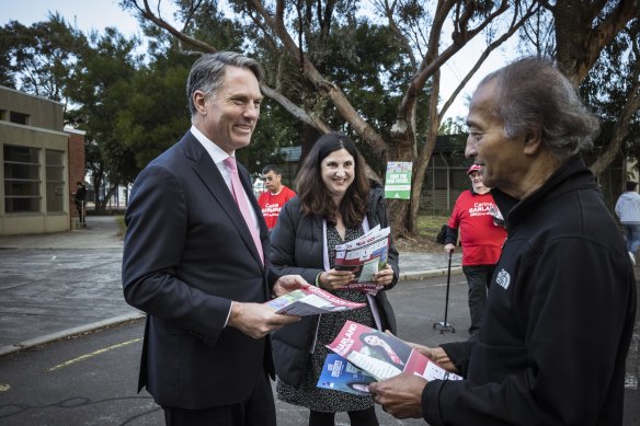 Labor deputy leader Richard Marles handing out how-to-vote cards in Melbourne.