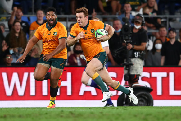 Andrew Kellaway of the Wallabies dives over to score a try.