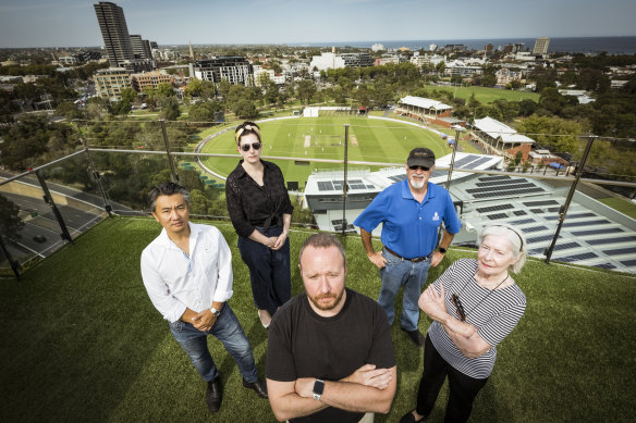 Taras Kontek (centre) says his apartment is just a stone’s throw away from Junction Oval.