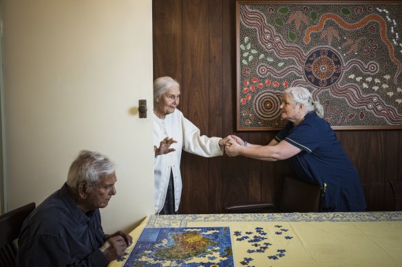 Maria McCreadie (right) is a home carer for Box Hill residents Dorothy (89) and Joseph (94) Van Gramberg.