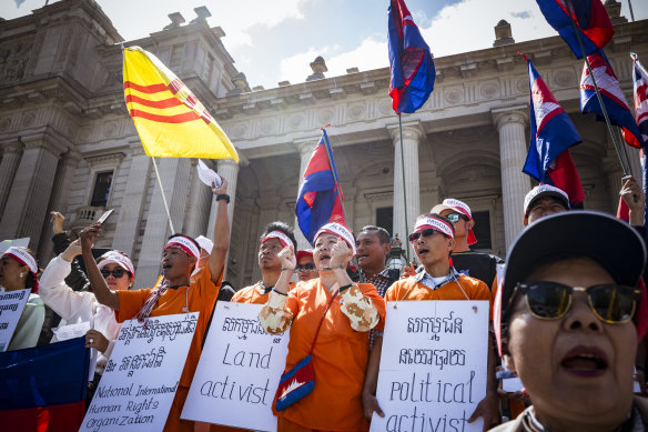 Demonstrators highlight human rights abuses in their birth countries at a rally outside Victoria’s Parliament House ahead of the ASEAN-Australia summit.