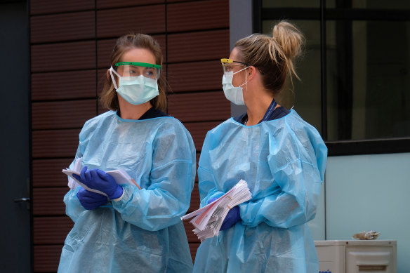 Nurses outside Royal Melbourne Hospital's COVID-19 testing clinic.