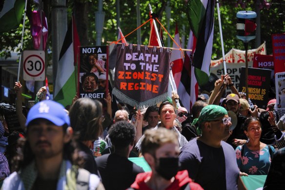 Pro-Palestinian protesters march through the streets of Melbourne on Sunday.