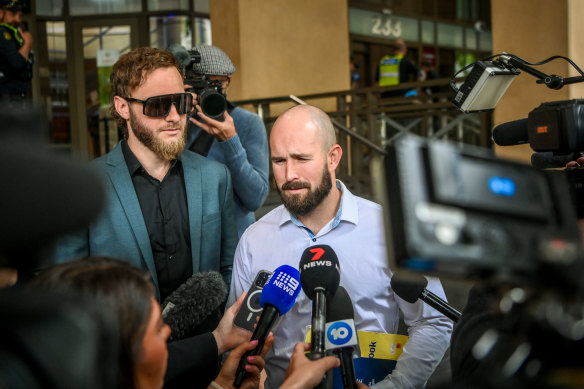 Joel Davis (left) and Thomas Sewell outside court this month supporting Jacob Hersant, who was sentenced for performing the Nazi salute.