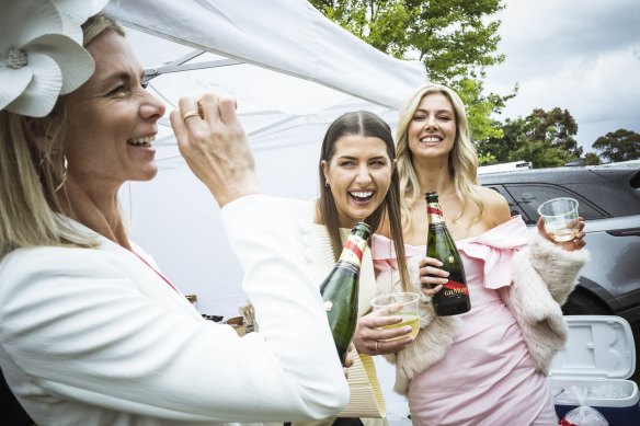 Caroline Knipe, Jasmine Ryan-Watson and Chelsea Matters at a car boot picnic in the Nursery members car park at Flemington at last year’s Melbourne Cup Carnival. 