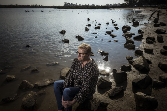 Tooradin resident Di Loft on the foreshore of the town, which is predicted to become increasingly vulnerable to inundation.