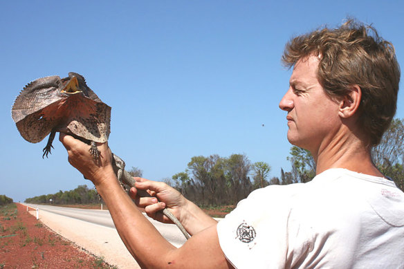 Geraldton reptile enthusiast and breeder David Mackintosh with a frill-necked lizard, one of the many Australian species sought by overseas buyers. 
