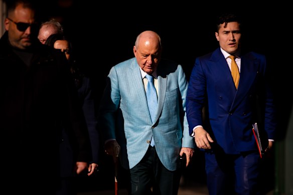 Alan Jones arrives at the Downing Centre Local Court on Wednesday.