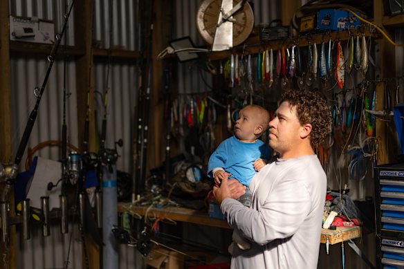 Luke Fitzpatrick, or “Fitzy,” owner of Advance Fishing with his son, Finn.