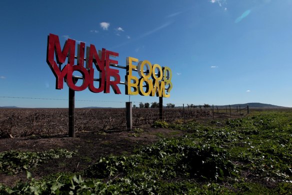 A sign in a farmer’s paddock on the Liverpool Plains, where Shenhua Watermark’s coal project was bought out by the NSW government after the miner failed to submit management plans required under the water trigger. 