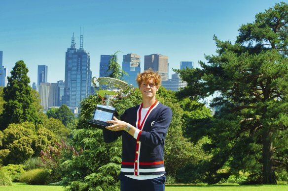 Jannik Sinner basks in the glory of his Australian Open win in Melbourne’s Royal Botanic Gardens on Monday.