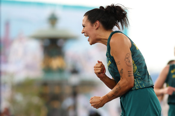 Australian 3x3 player Alex Wilson pumps her fist.