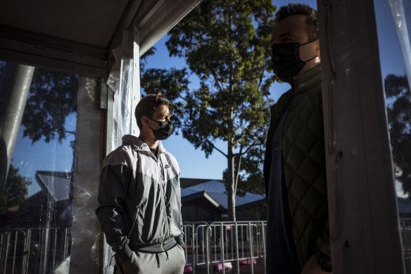 Jake Talevski,19, and his father, Rob, were front of the queue at the Showgrounds for Jake’s vaccine.  