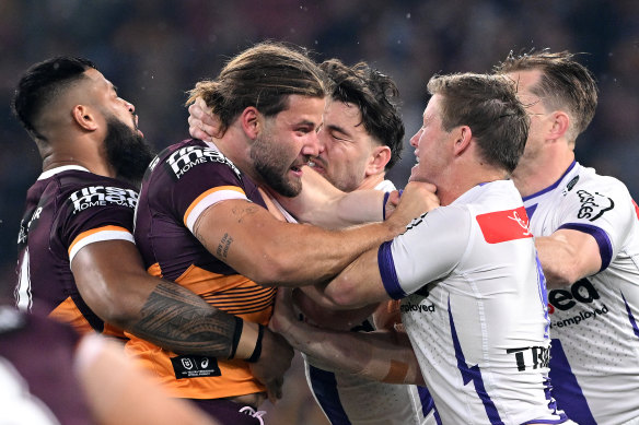 Pat Carrigan and Harry Grant get physical just 45 seconds into Friday night’s game.