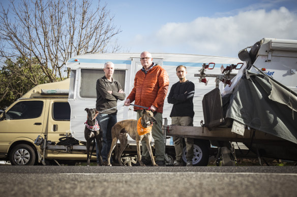 Residents (from left) Justin Halliday, Brian Murray and Rio Filgueira with caravans left in Alexandra Street, St Kilda East.