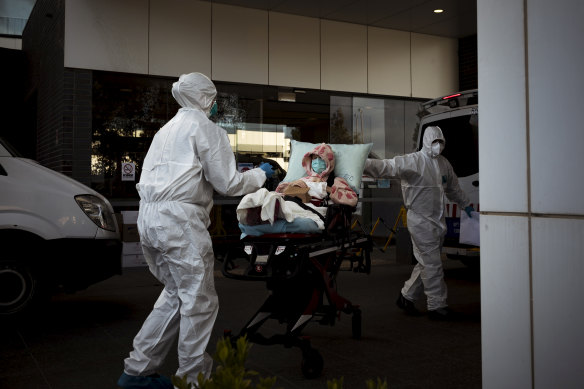 A patient is taken from Epping Gardens Aged Care on Tuesday.