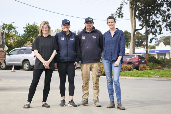 Steph Ryan, Sandra O’Sullivan, Gerard O’Sullivan and Annabelle Cleeland during the flood clean-up in Seymour on October 18.