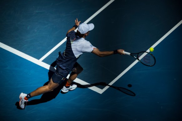 Alex De Minaur runs fast.